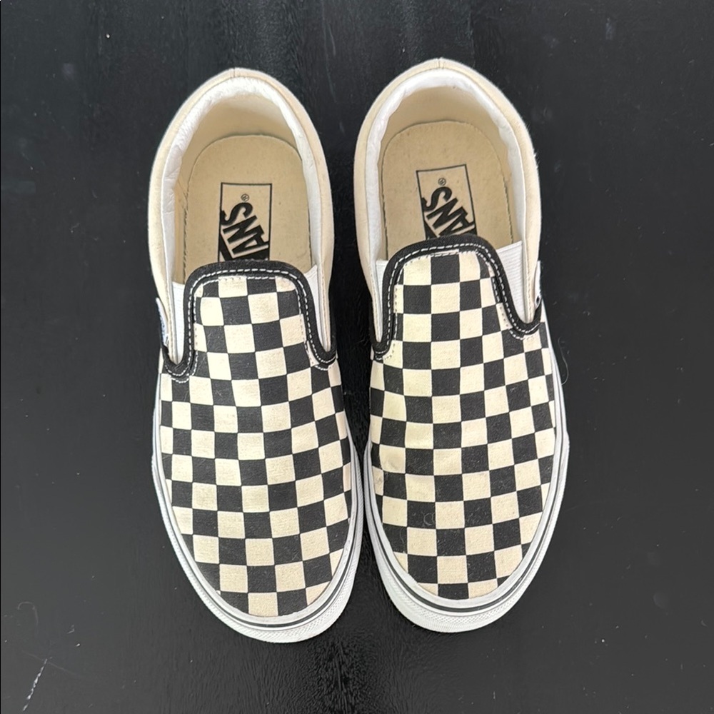 Vans Black and Cream Sneakers with Iconic Design